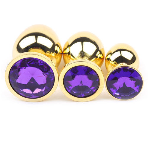 1 Single Golden Metallic Butt Plug with Purple Diamond